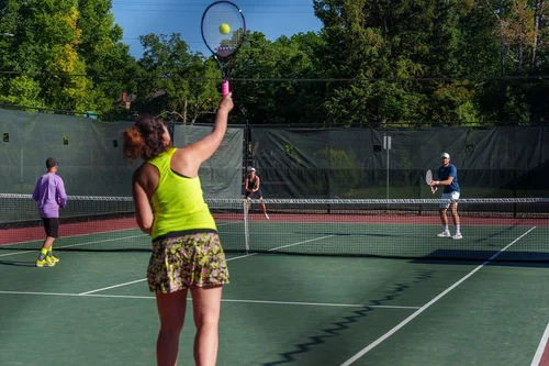 Mixed doubles serve at Denver City Open