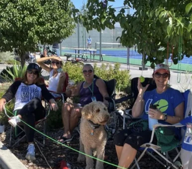 Group of friends with dog at Longmont Open